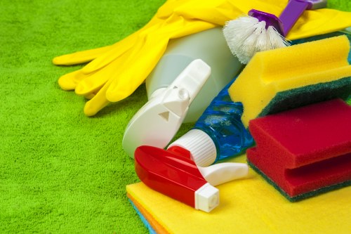 Team member following safe carpet cleaning procedures